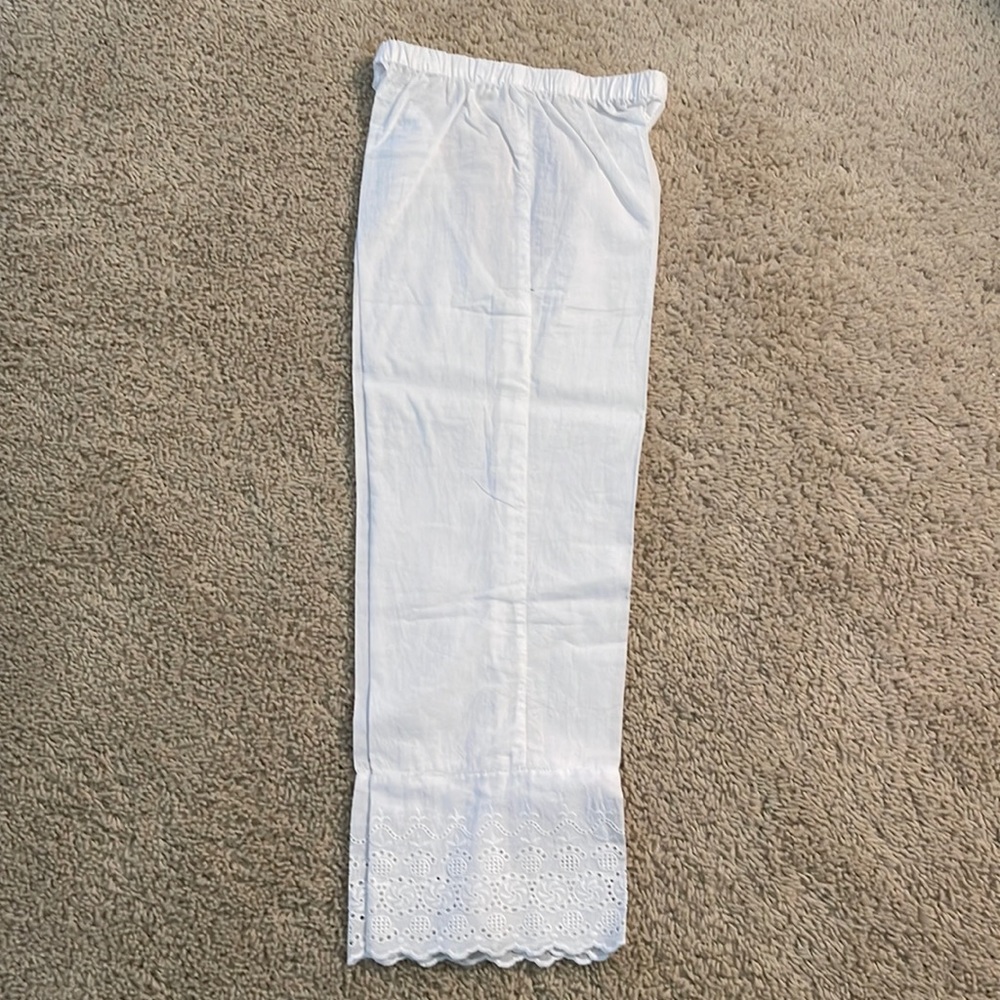 Girls Minnie minors lawn straight pants with embroidery on bottom part.
